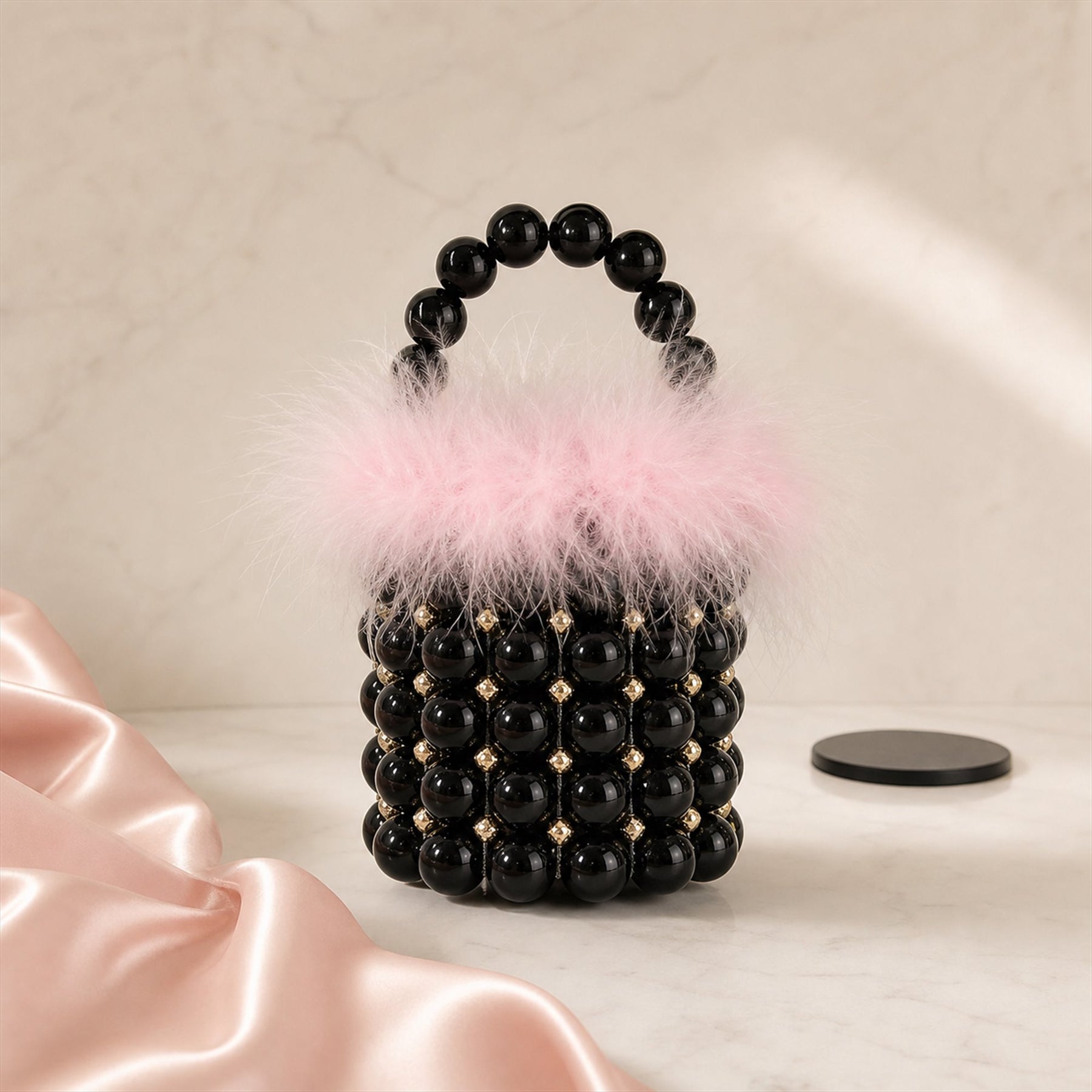Black Pink feather-trim beaded mini bucket bag lifestyle image