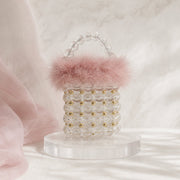 Clear Pink feather-trim beaded mini bucket bag lifestyle image