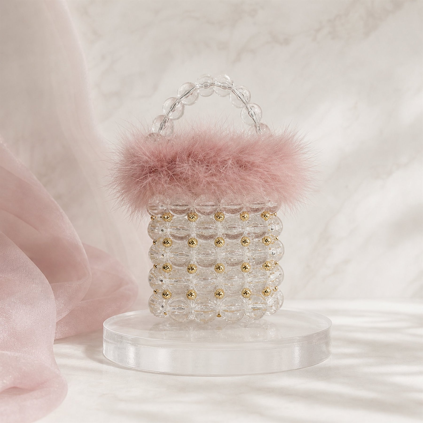 Clear Pink feather-trim beaded mini bucket bag lifestyle image