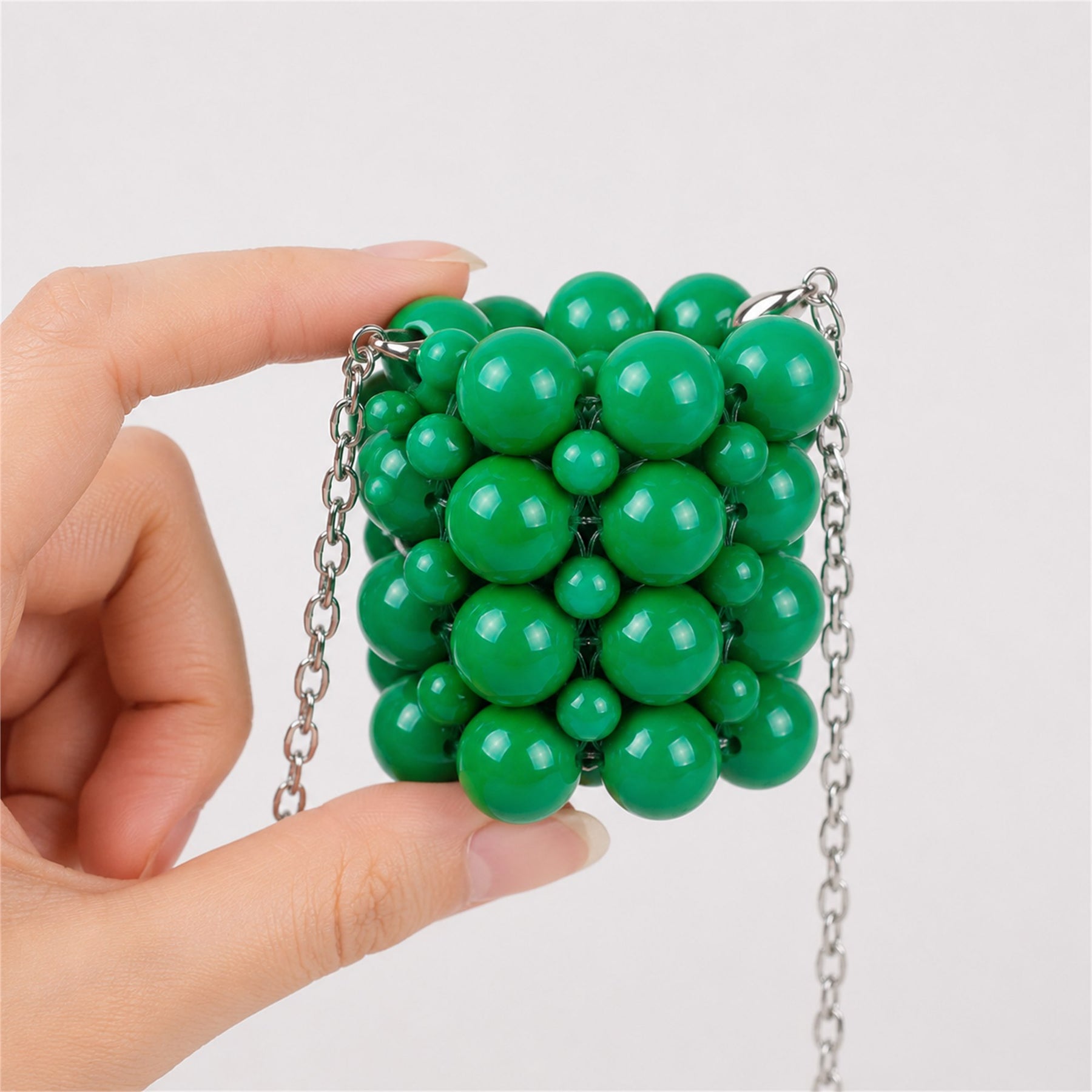 Marelune green beaded mini lipstick bag detail - AI-assisted draft preview