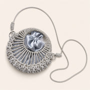 Marelune Celeste Round Drawstring Crossbody Bag in Silver Small - angle view 1